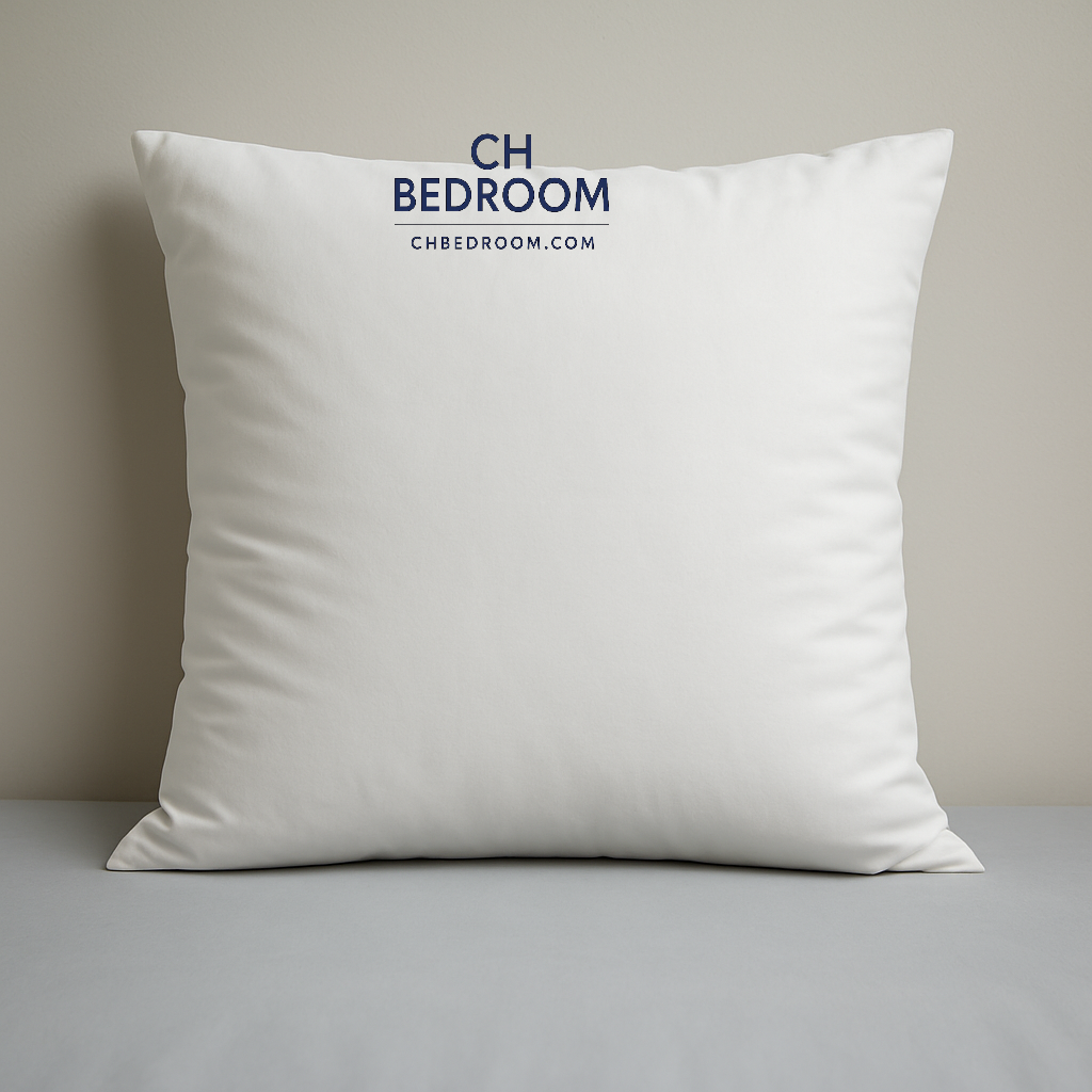 White sofa pillow with the logo of the canadian company 'CH BEDROOM' on a neutral background #chbedroom #canada #canadahomedecoration #canadabedroom #sleepingpillow #sodapillowcanada #sofa pillow #mattress #bedsetsmontreal