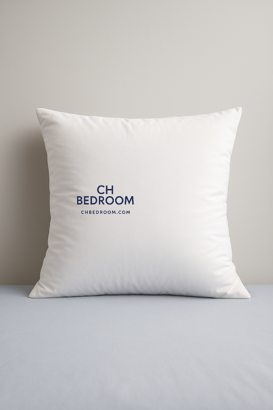 White pillow made of duck feather on a mattress with 'CH BEDROOM' text on a gray surface. #pilowcanada #canadahomefurnitures #pillowmontreal